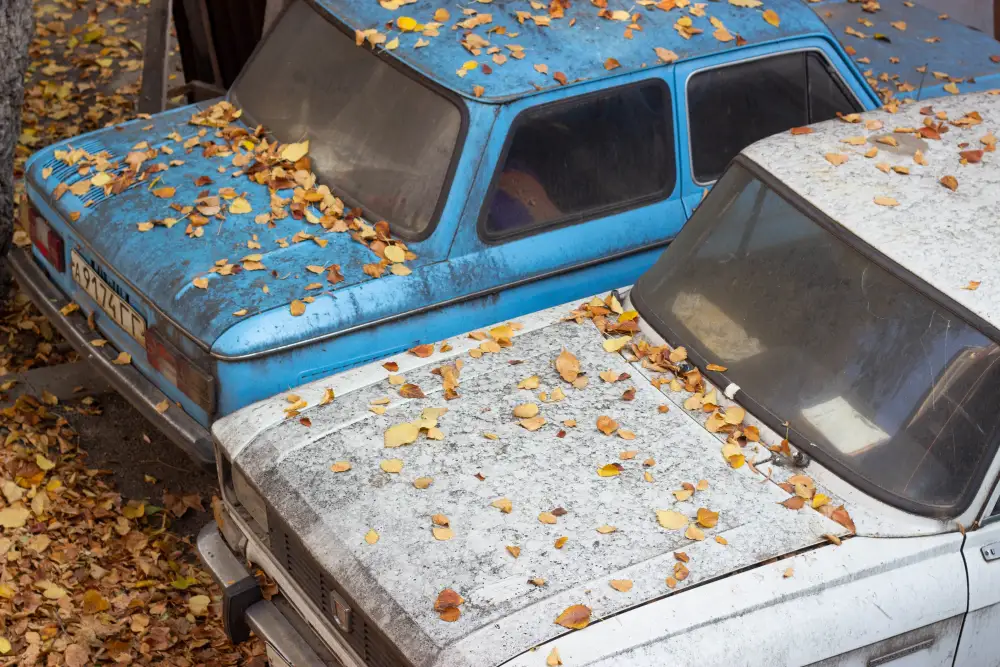 Old cars stacked for scrap metal recycling in Bendigo
